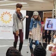 NPCF Fashion Funds the Cure Mall Runway Show with two models